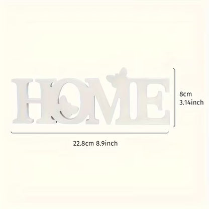 Interjero dekoracija su užrašu HOME – modernus namų dekoro elementas