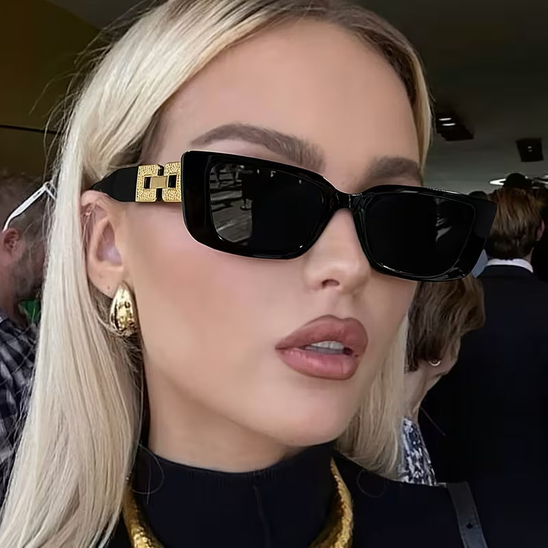 Elegantiški moteriški saulės akiniai juodos spalvos su auksiniais akcentais