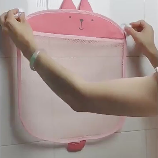 vonios žaislų krepšys su lapės veidu ir tinkleliu, pritvirtintas prie vonios sienos